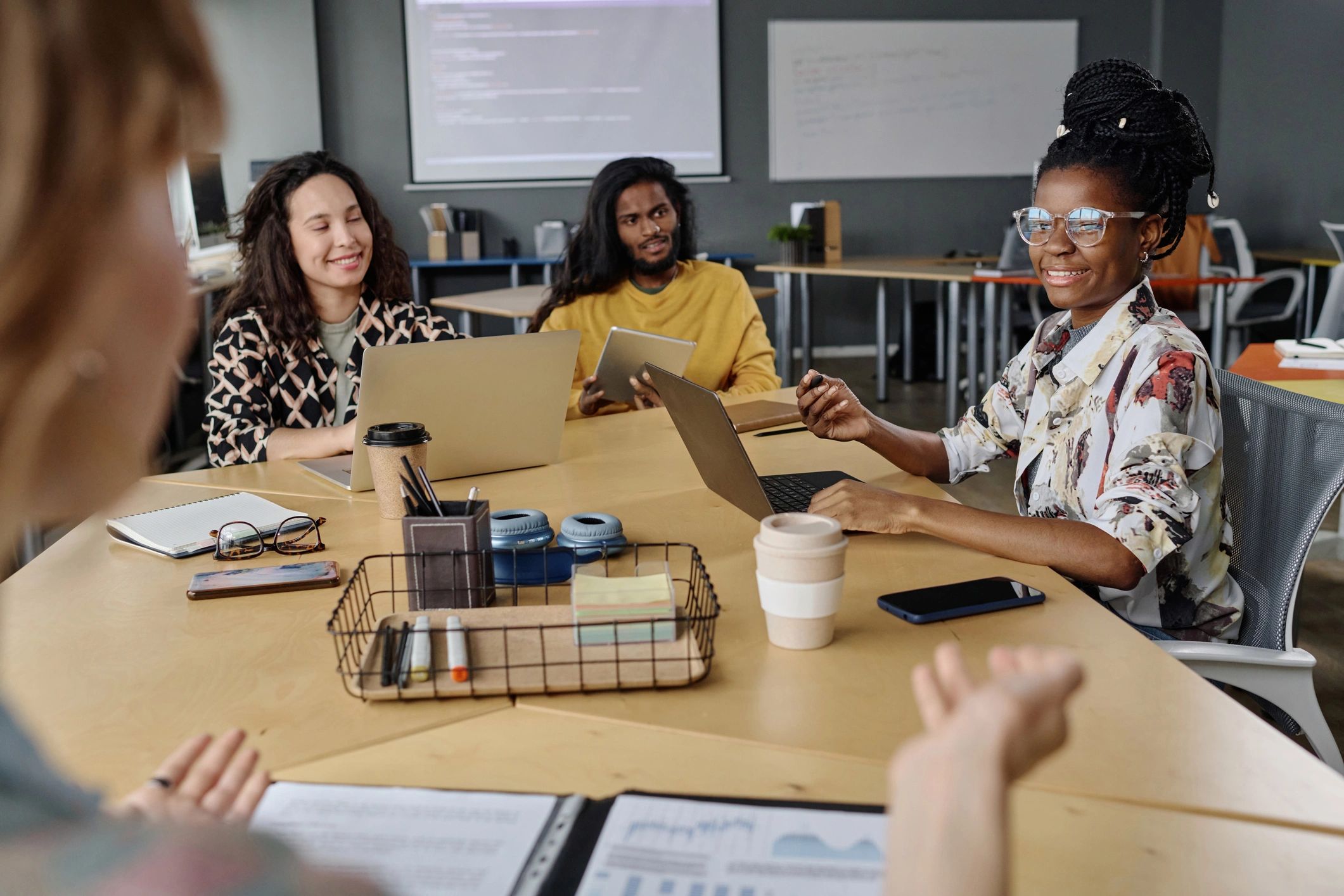 Coworkers listening during a planning meeting